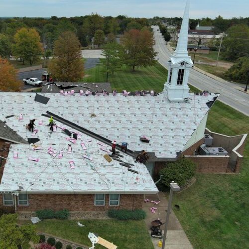 a commercial church roof being replaced
