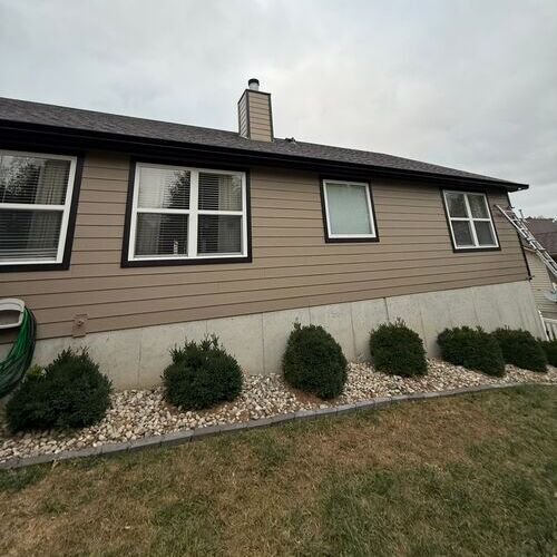 beige hardie board siding on a home